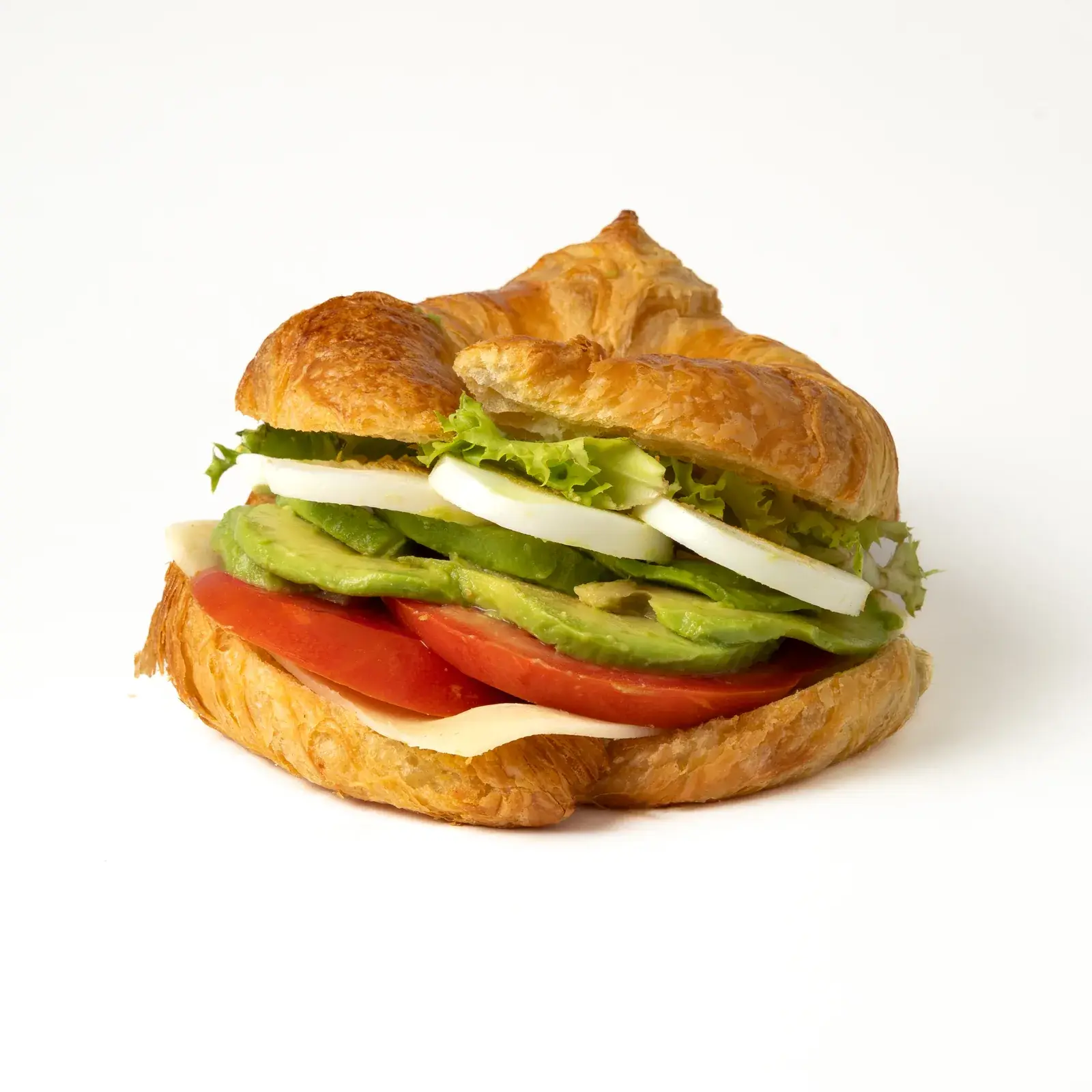 Croissant vegetal del Cheesy Brunch con lechuga, huevo cocido, aguacate, tomate y queso